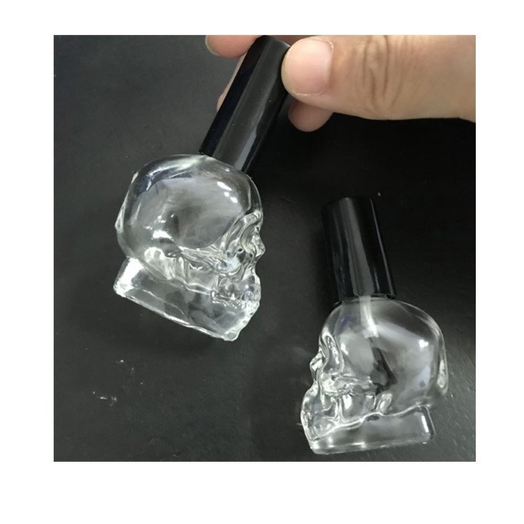 Unique 10ml 15ml Skull shape empty nail polish glass bottle with brush