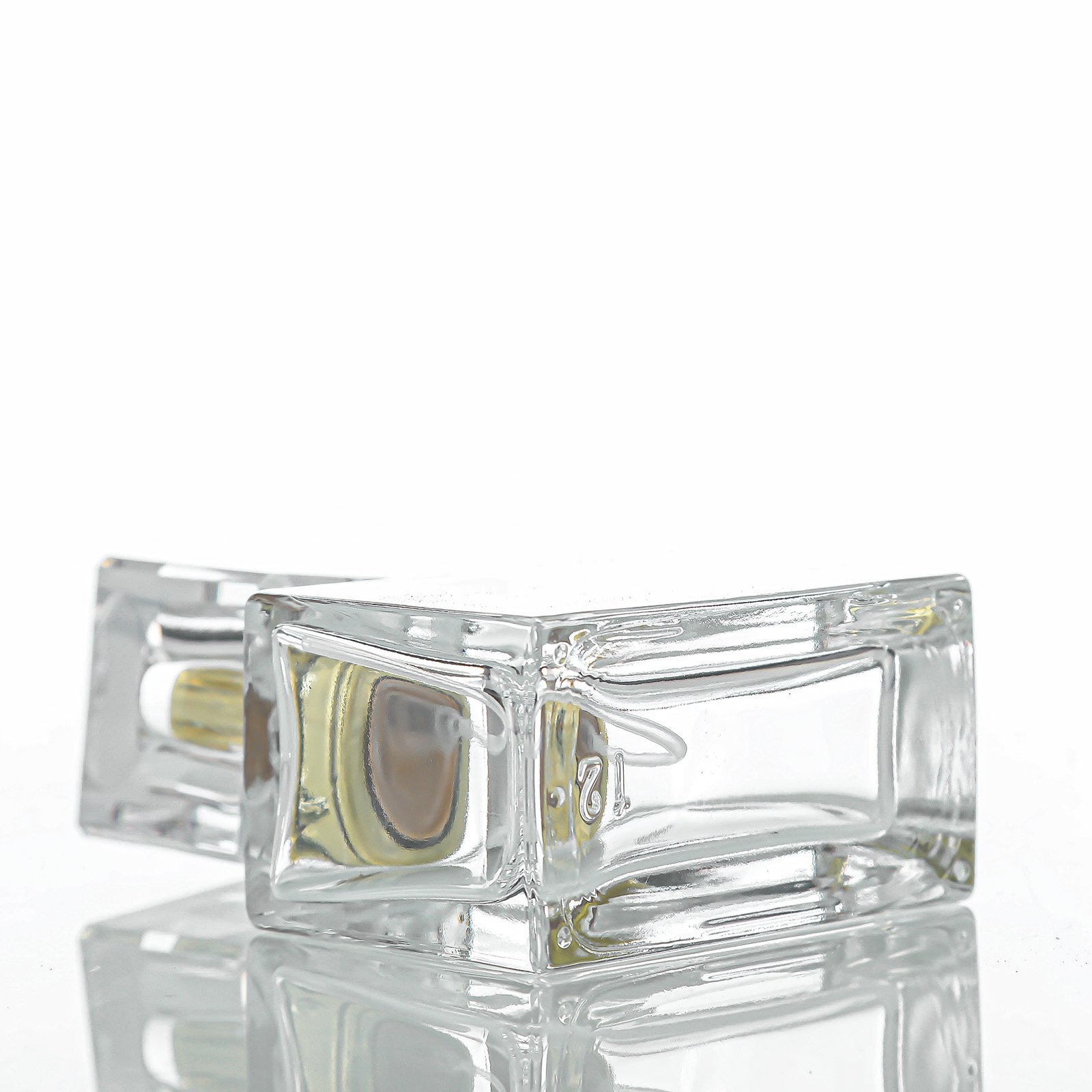 Wholesale square perfume spray bottle 50ml 100ml transparent perfume bottle