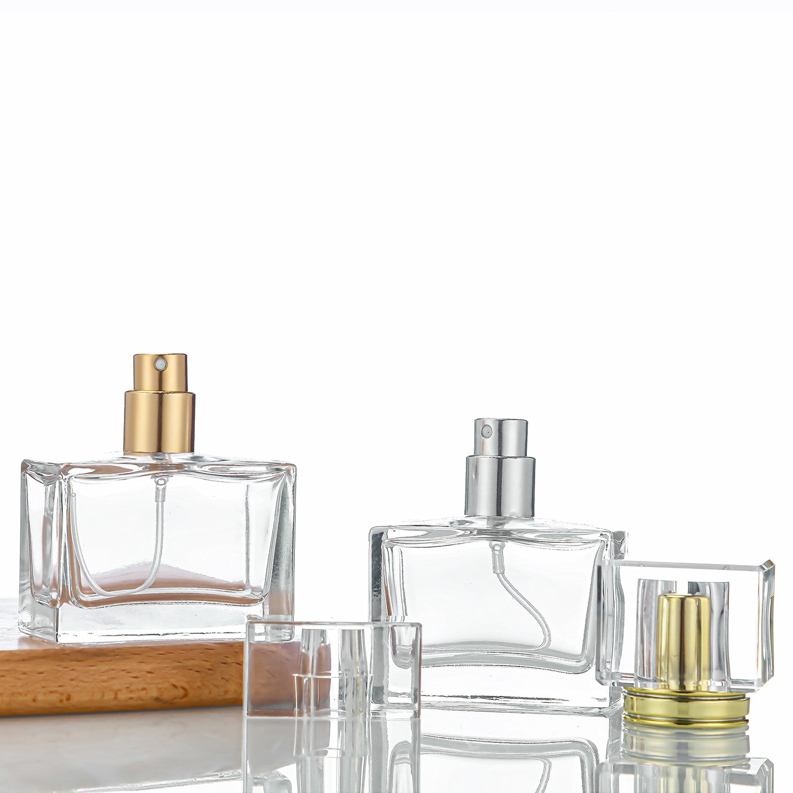 Wholesale square perfume spray bottle 50ml 100ml transparent perfume bottle