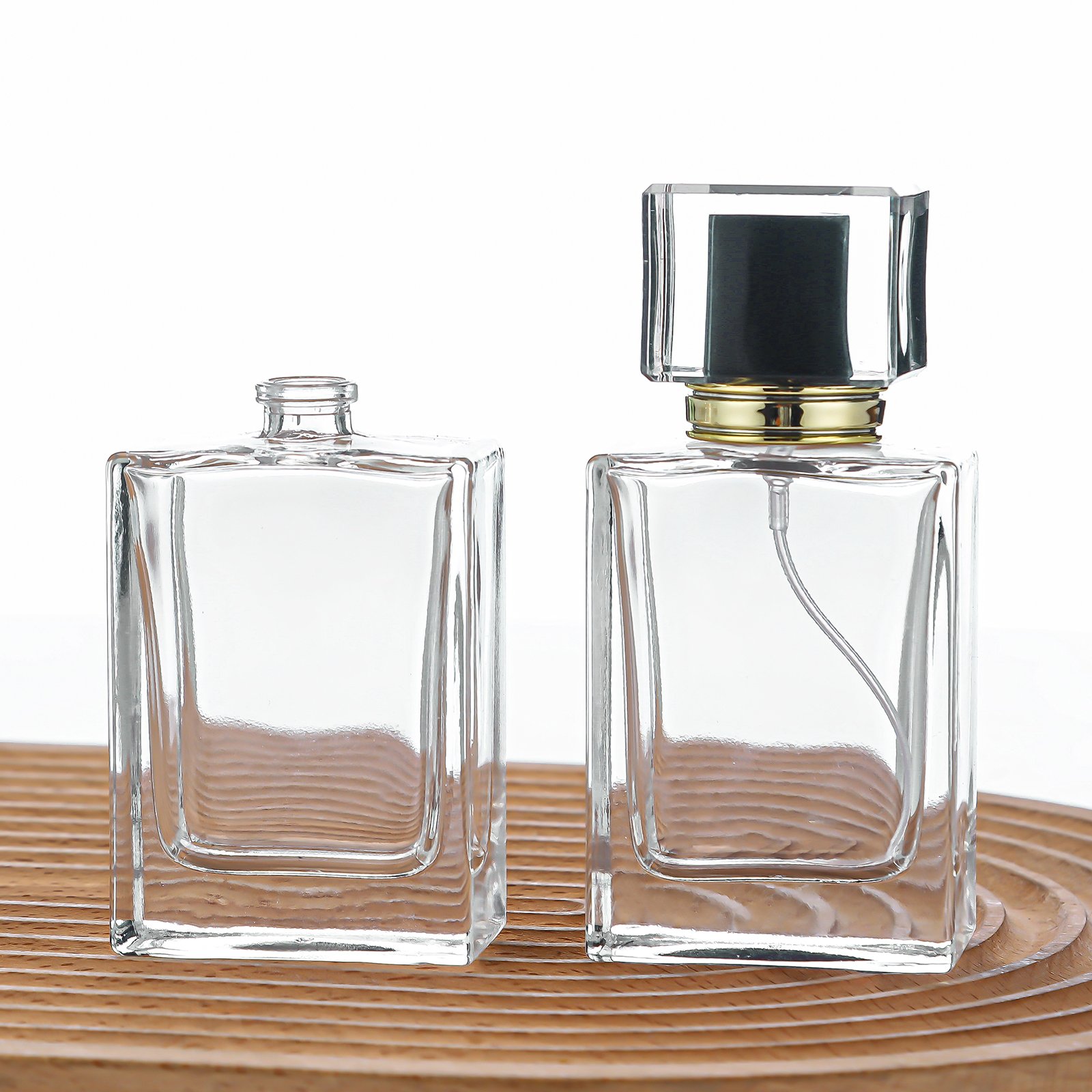 Wholesale square perfume spray bottle 50ml 100ml transparent perfume bottle