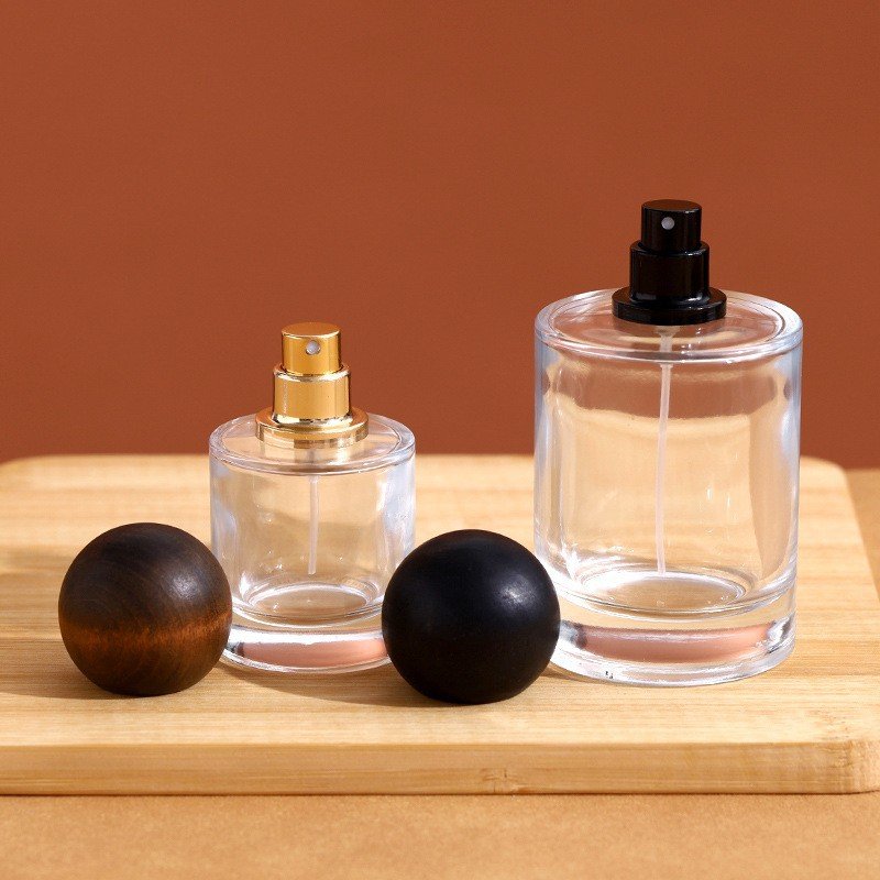 Custom Round Cube Perfume Bottle 30ml 50ml 100ml Clear Perfume Glass Bottles Gold silver pump With Wooden Cap