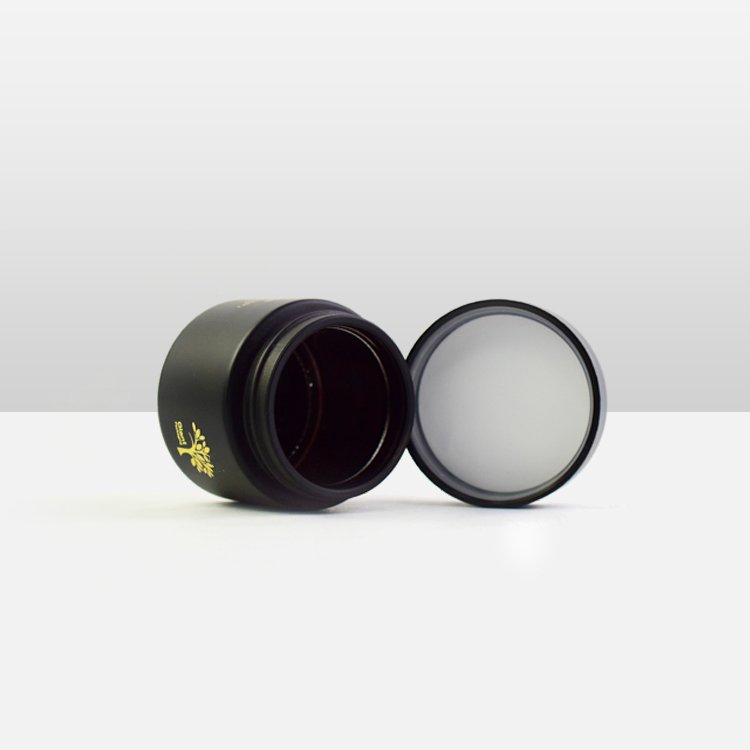 Custom Flower Packaging 57mm Diameter Glass Jar Label Custom Design Frosted Cream Black UV Glass Scrub Cosmetic Jar Glass Bottle