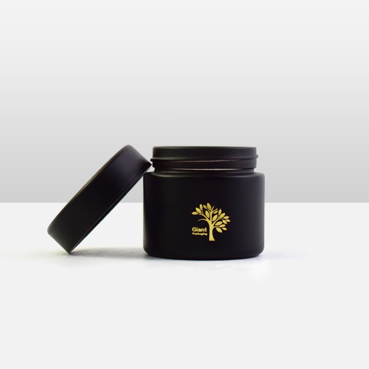 Custom Flower Packaging 57mm Diameter Glass Jar Label Custom Design Frosted Cream Black UV Glass Scrub Cosmetic Jar Glass Bottle