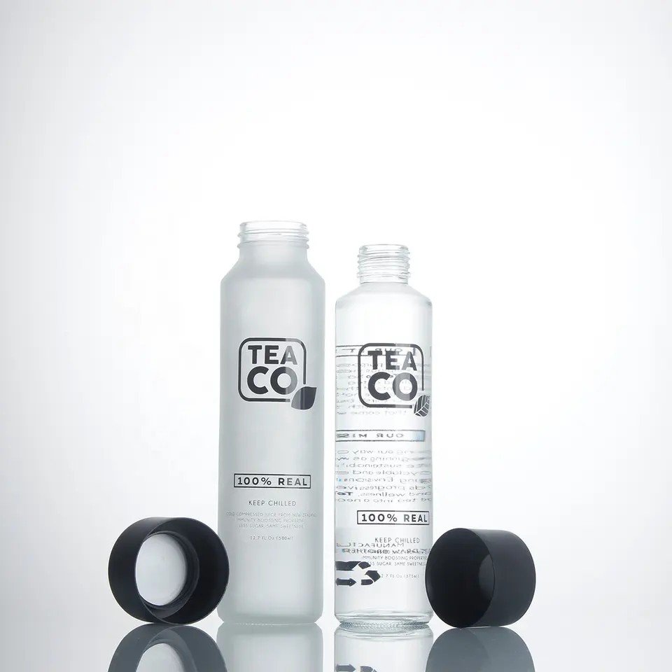 High quality clear 1000ml 750ml 500ml 375ml high flint juice drink beverage mineral water glass bottle with plastic lid