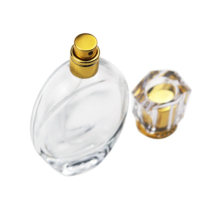 Factory wholesale oval 50 ml high quality glass bottle perfume bottle with Press type spray cover custom logo