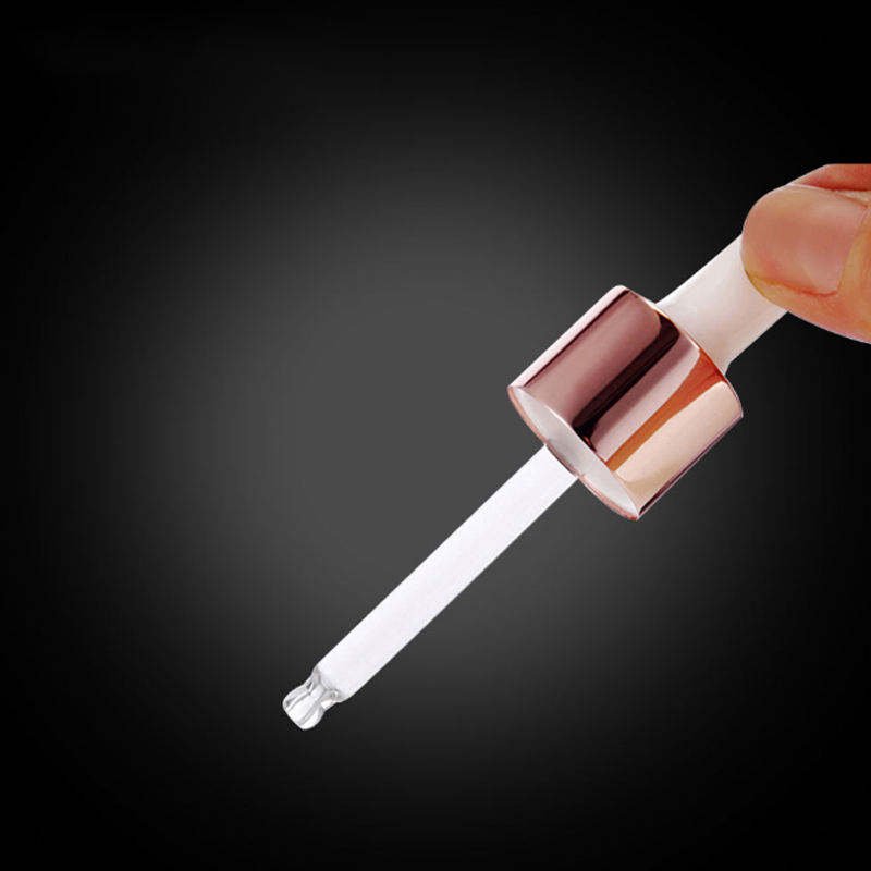 Wholesale cylinder 20ml 30ml 50ml 100ml essential oil glass bottle with golden shoulder shank dropper cap