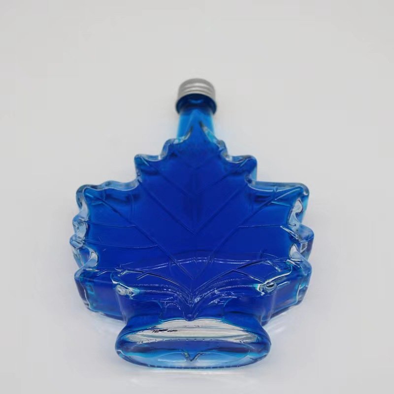 50ml 100ml 150ml Maple Leaf Unique Beverage Vodka Cannabis Glass Bottle with Screw Cap