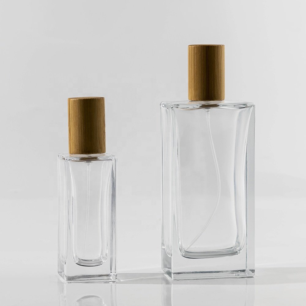 Wholesale 50ml 100ml Empty Perfume Glass Bottles Round Clear Refillable Perfume Bottle With Wooden Lid Perfume Fragrance Packing