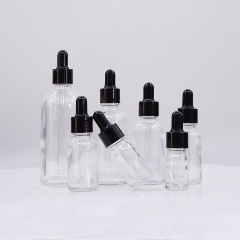 Clear essential oil bottle with dropper 5ml 10ml 15ml bottle for cosmetic black lid essential oil glass bottle