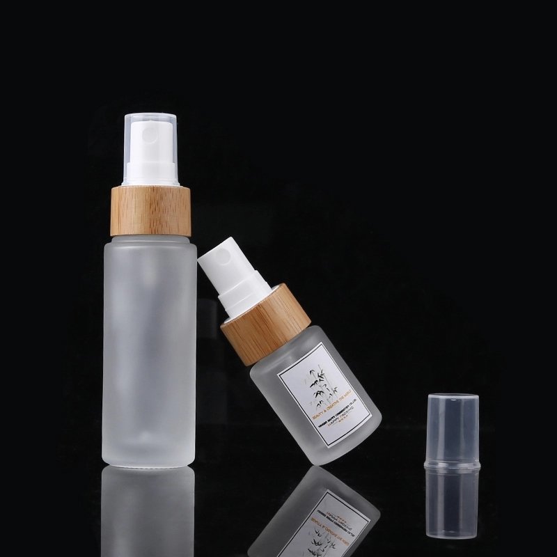 Glass Cosmetic lotion Bottles Frosted Glass Spray Bottles 100ml with Bamboo Pump Spray