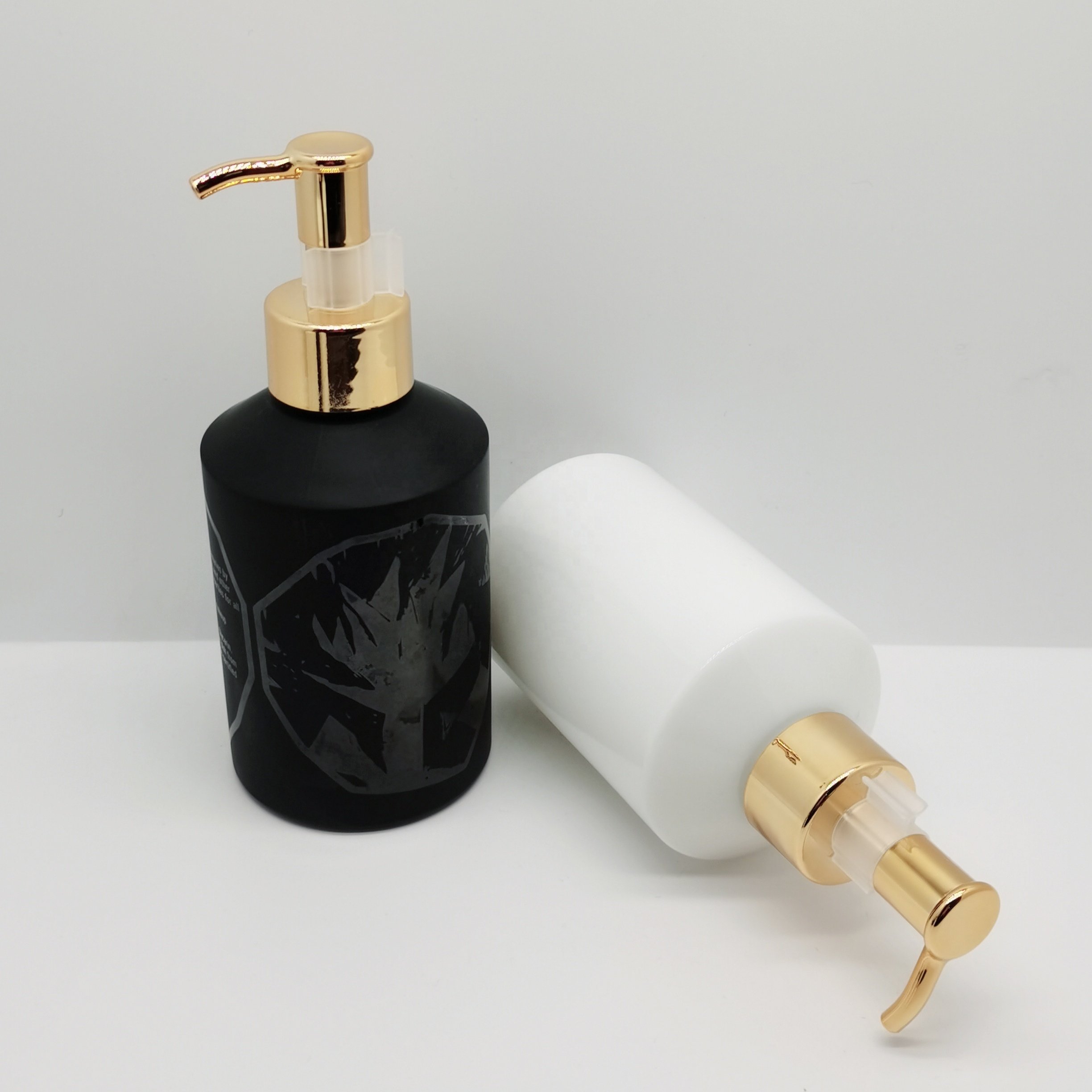 Cosmetic glass bottle packaging 200ml opal white and matte black slant shoulder glass oil bottle with gold lotion pump