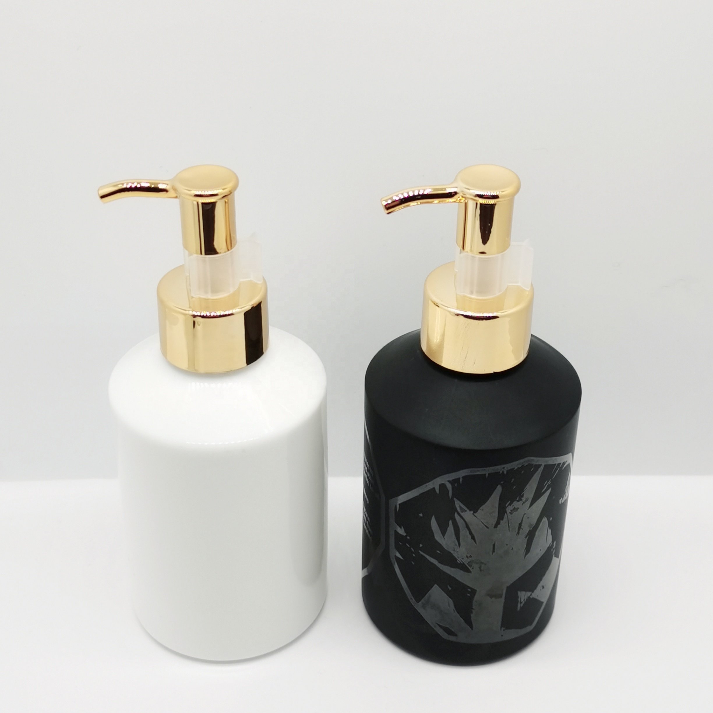 Cosmetic glass bottle packaging 200ml opal white and matte black slant shoulder glass oil bottle with gold lotion pump