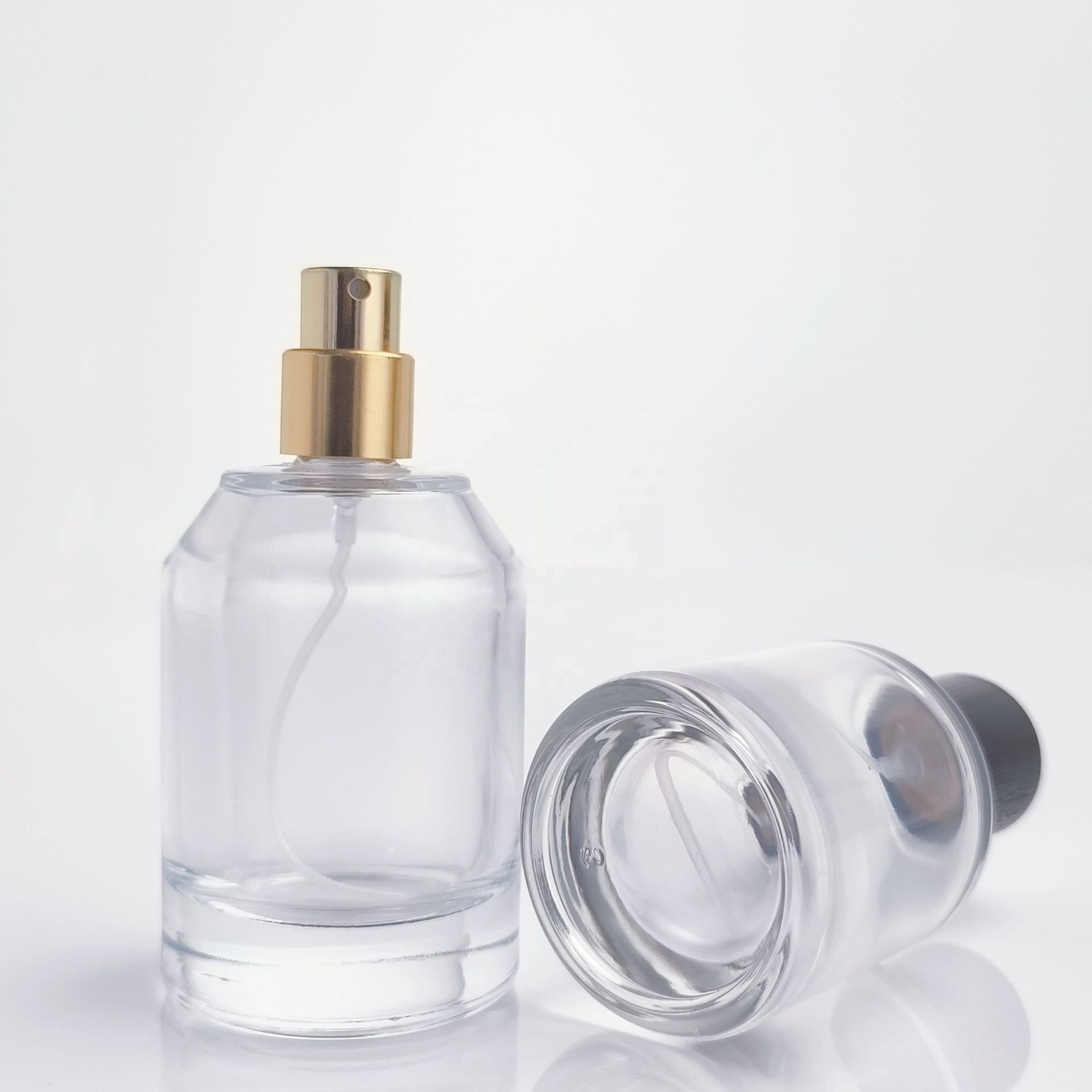 Empty luxury perfume glass bottles 50ml100ml fragrance bottle perfume glass round cosmetic glass spray bottle with cap Atomizer