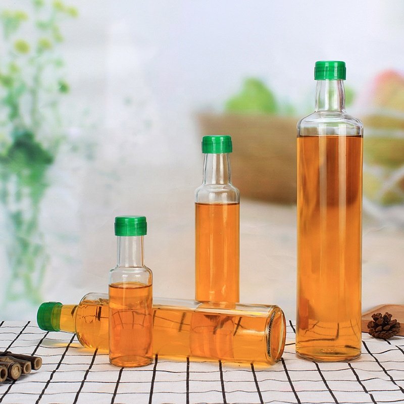 Bulk 100ml 250ml 500ml 750ml 1L Round Clear Marasca Packaging Cooking Oil Bottle With Lid Empty Glass Bottle For Olive Oil