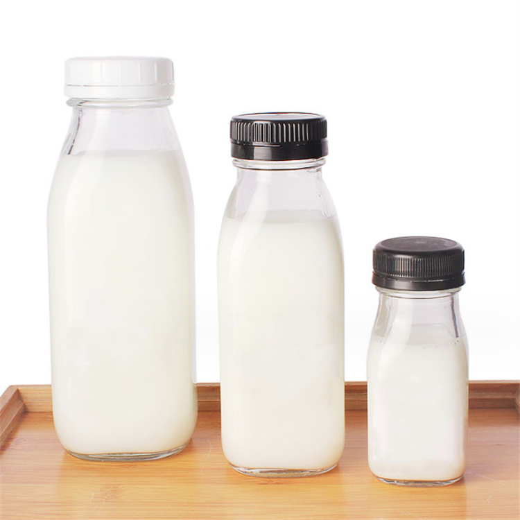 Wholesale square reusable tea beverage drinking 300ml 500ml empty milk glass juice bottles with cap