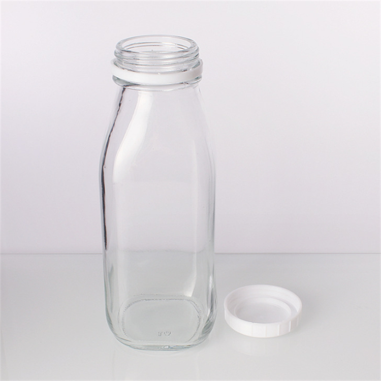 Wholesale square reusable tea beverage drinking 300ml 500ml empty milk glass juice bottles with cap