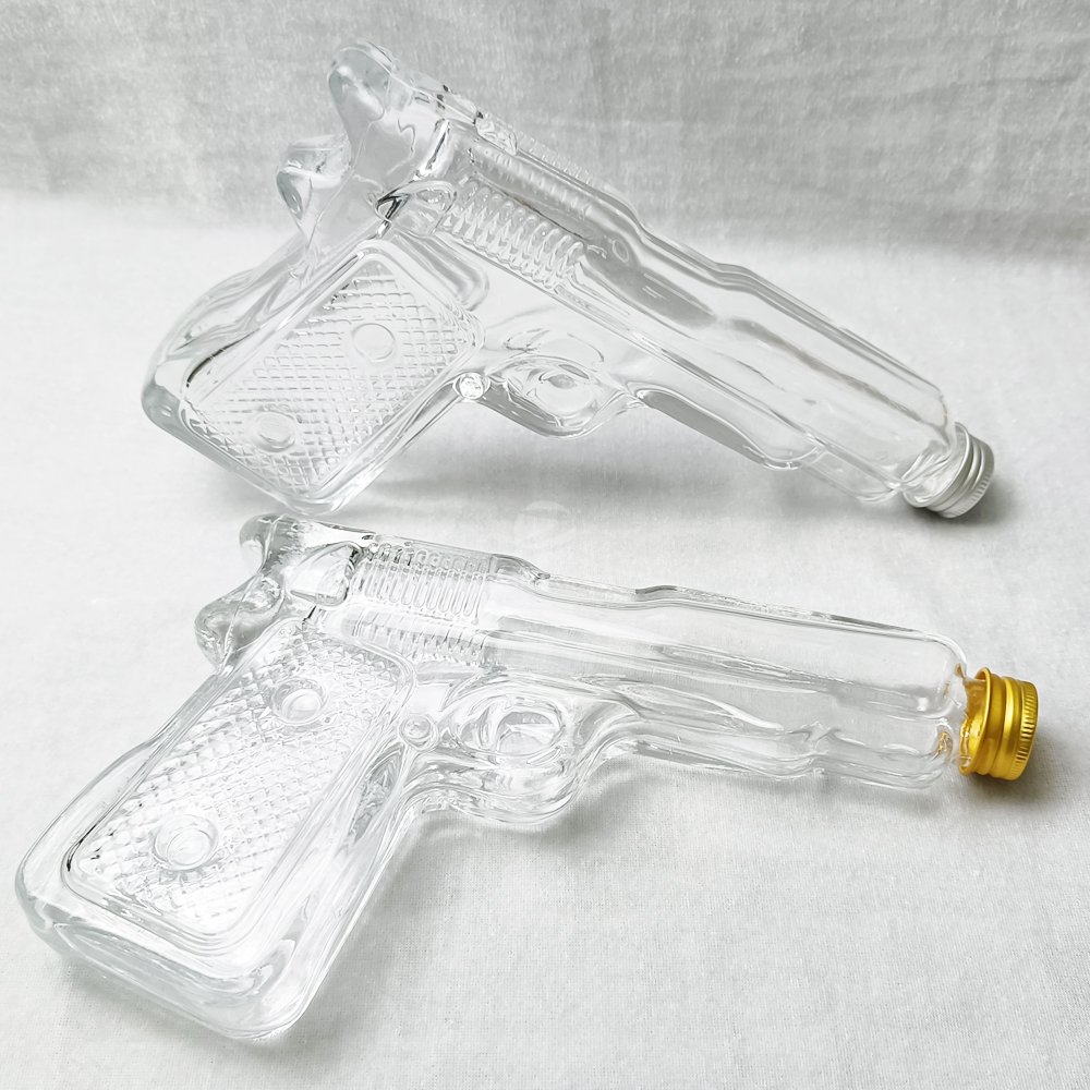 220ml Special Gun Shape Glass Bottle with Screw Cap Gun Bottle