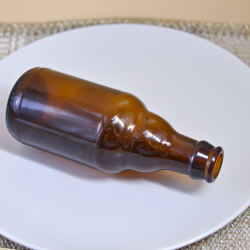Wholesale 230ml round amber beer glass bottle with crown lid