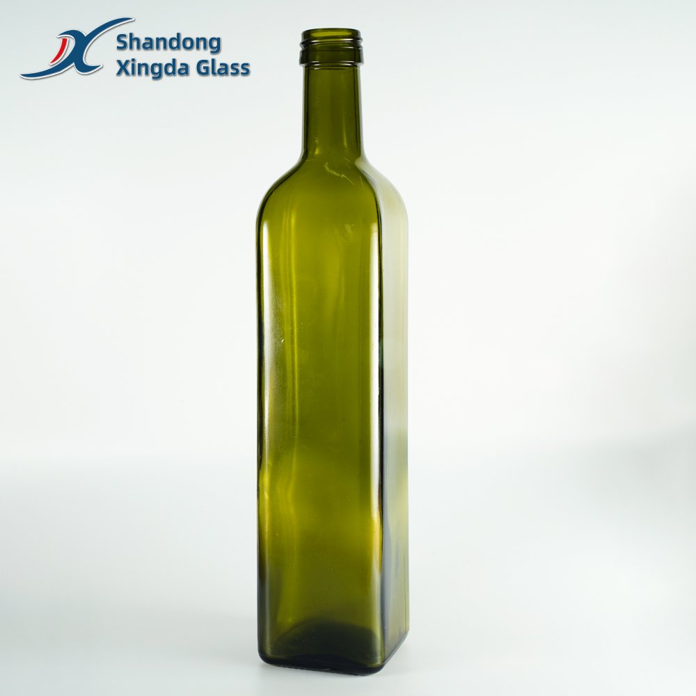 Xingda Custom Round Dark Green Glass Essential Oil Bottle Vinegar Bottle Olive Oil Glass Bottle Factory