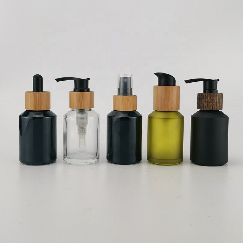 shiny black glass bottle 60 ml black glass container 2 oz cosmetic bottle with dark brown color wood closure dropper and pump