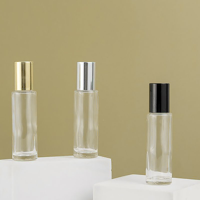 PERFUME Hot Sale Cheap Round Shape Empty 10ml Clear Glass Bottle Essence Oil Metal Ball Roll On Bottles With Caps