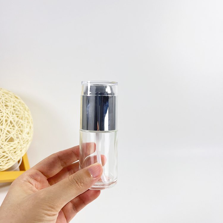 Luxury 1 oz Small Clear Glass Bottle Packaging 30ml Glass Lotion Bottle Spray Cosmetic Skincare Pump Glass Bottle With Lid