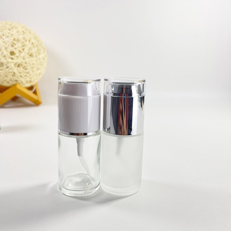 Luxury 1 oz Small Clear Glass Bottle Packaging 30ml Glass Lotion Bottle Spray Cosmetic Skincare Pump Glass Bottle With Lid