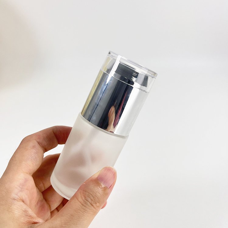 Luxury 1 oz Small Clear Glass Bottle Packaging 30ml Glass Lotion Bottle Spray Cosmetic Skincare Pump Glass Bottle With Lid