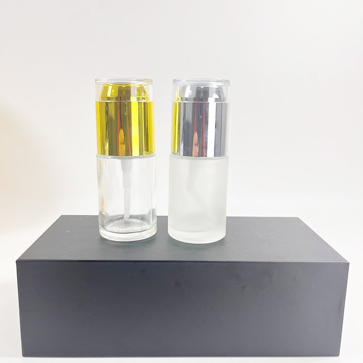Luxury 1 oz Small Clear Glass Bottle Packaging 30ml Glass Lotion Bottle Spray Cosmetic Skincare Pump Glass Bottle With Lid