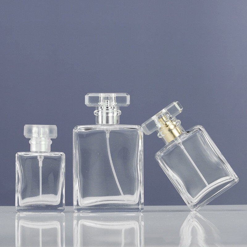BESTSUN wholesale 30ml 50ml 100ml clear empty fragrance glass with pump spray lid perfume bottle square atomizer for cosmetic