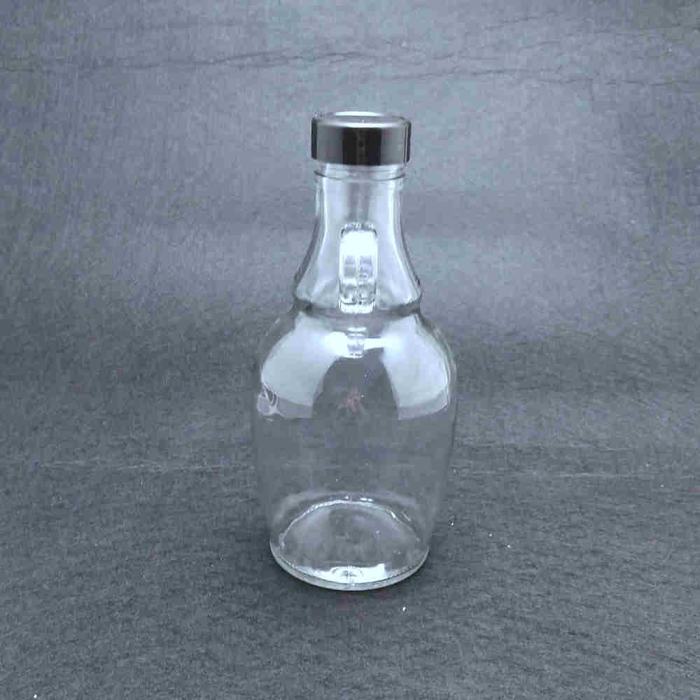 Wholesale clear glass bottle for liquor drinking