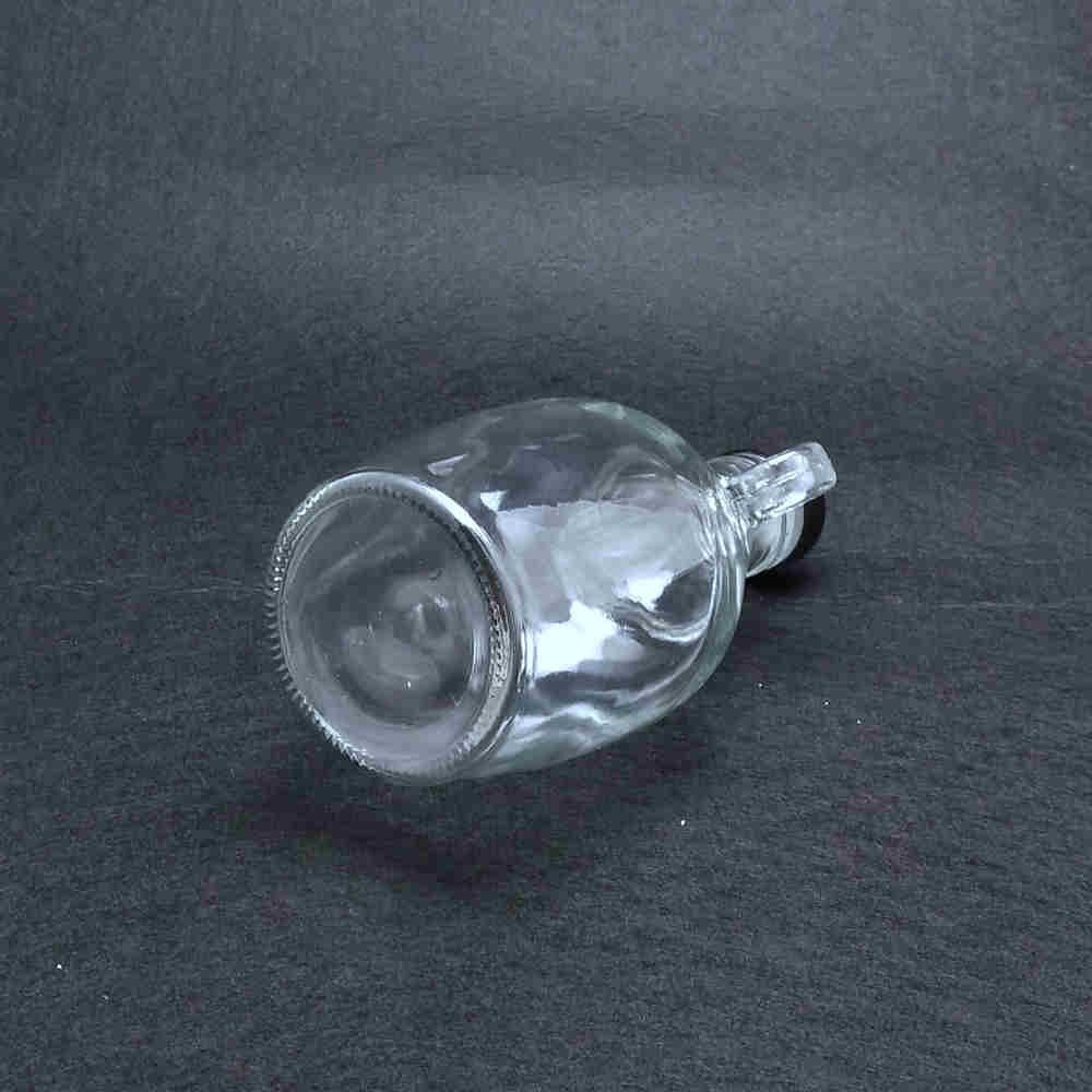 Wholesale clear glass bottle for liquor drinking