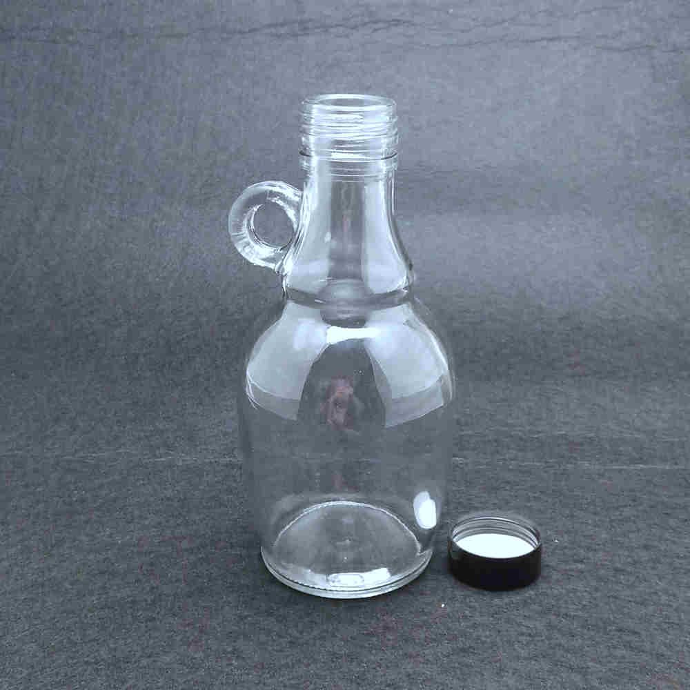 Wholesale clear glass bottle for liquor drinking