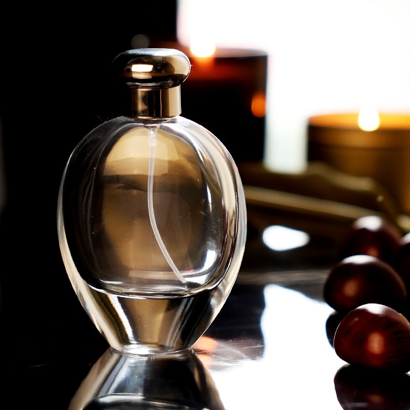 Hot Selling Wholesale 50ml 100ml Oval Shape New Design Luxury Refill Fine Mist Spray Pump Perfume Glass Bottle Supplier with Lid