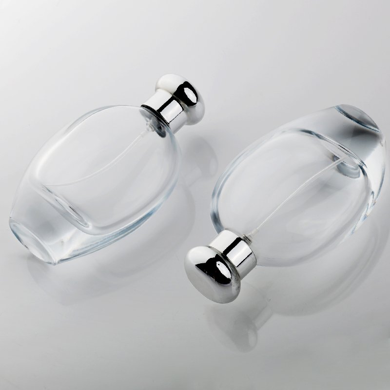 Hot Selling Wholesale 50ml 100ml Oval Shape New Design Luxury Refill Fine Mist Spray Pump Perfume Glass Bottle Supplier with Lid
