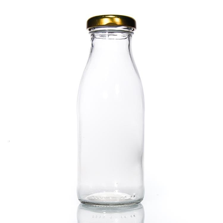 Wholesale Free Sample 100ml 200ml 250ml 500ml 1000ml Clear Empty Recycled Round Glass Milk Bottles With Screw Lid