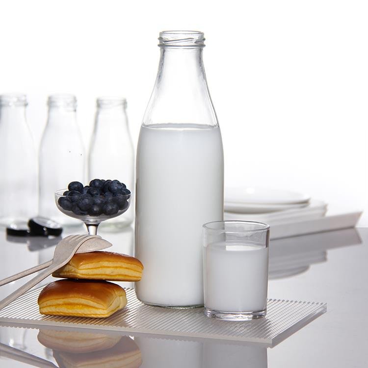 Wholesale Free Sample 100ml 200ml 250ml 500ml 1000ml Clear Empty Recycled Round Glass Milk Bottles With Screw Lid