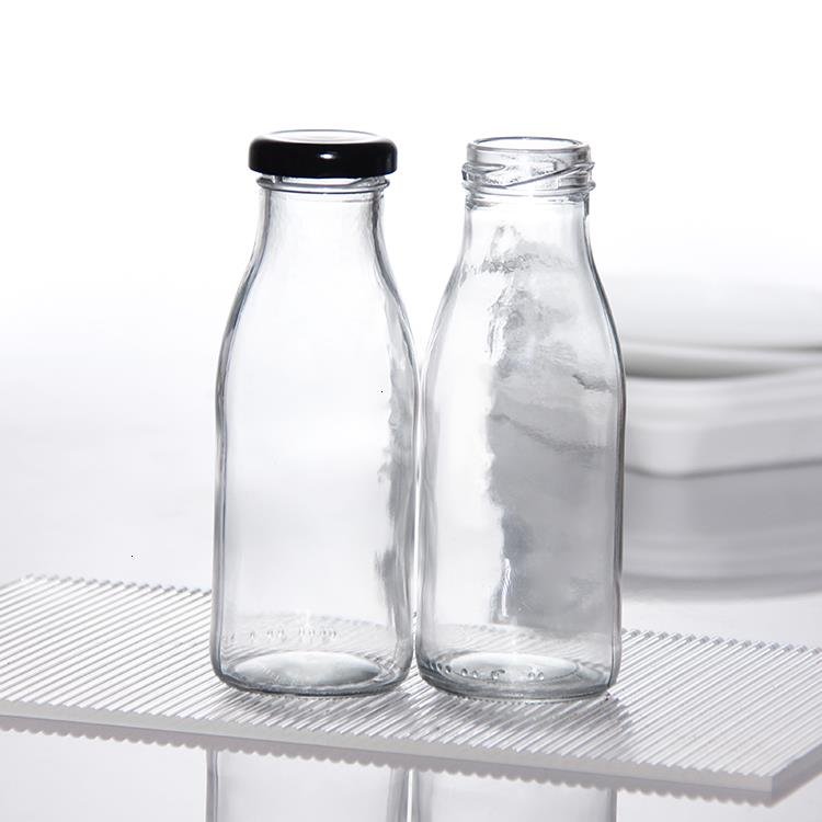 Wholesale Free Sample 100ml 200ml 250ml 500ml 1000ml Clear Empty Recycled Round Glass Milk Bottles With Screw Lid