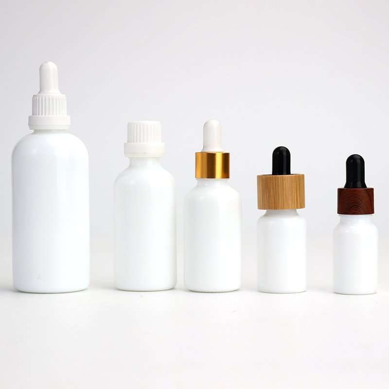 Round white 10ml 15ml 20ml 30ml 50ml 100ml glass white essential oil cosmetic bottle with cap