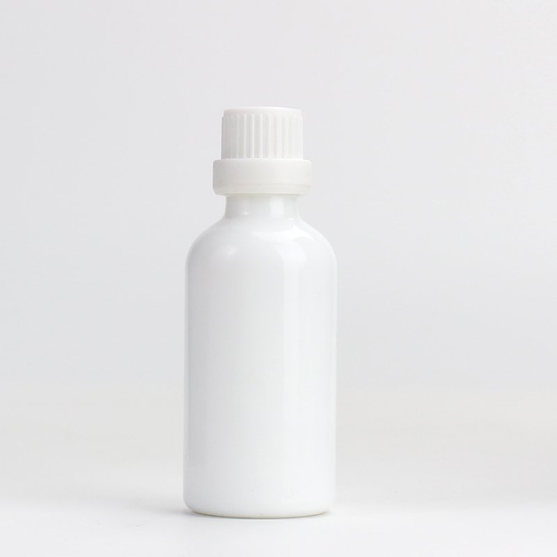 Round white 10ml 15ml 20ml 30ml 50ml 100ml glass white essential oil cosmetic bottle with cap