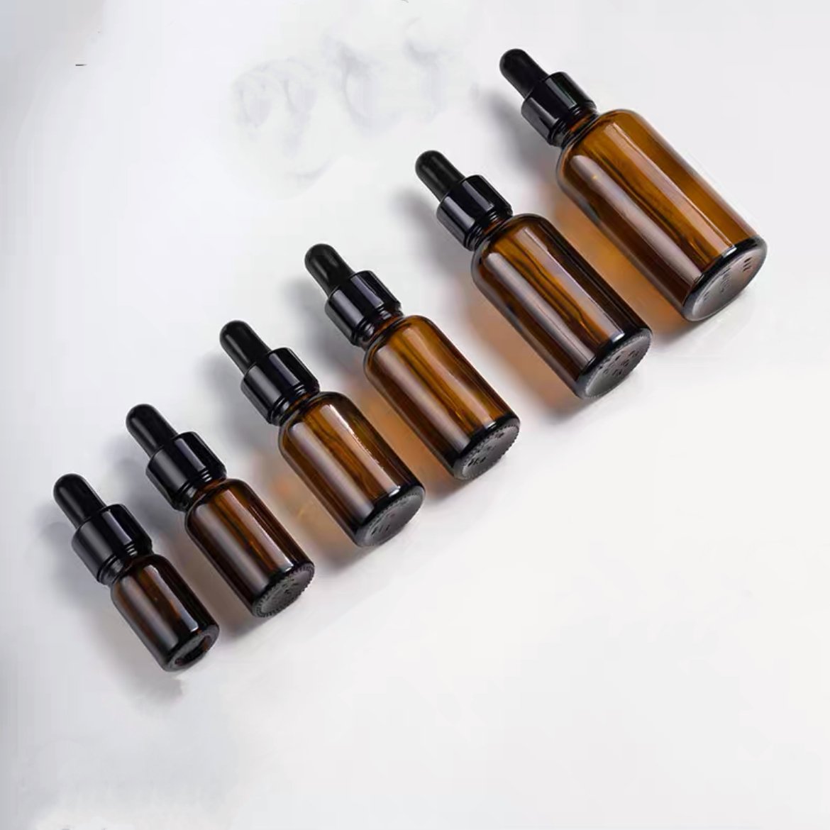 Customized 5ml 10ml 15ml 20ml 30ml 50ml high quality amber glass bottle with gradient dropper for lotion cosmetic