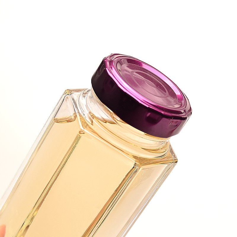 China Wholesale Cheap Custom Empty Clear Food Grade Storage Hexagonal Glass Honey Jam Jar with Screw Lids