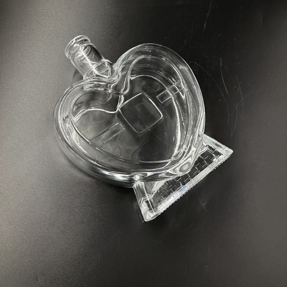 Premium customized painting electroplating glass spray perfume heart shape bottles 750ml glass bottles
