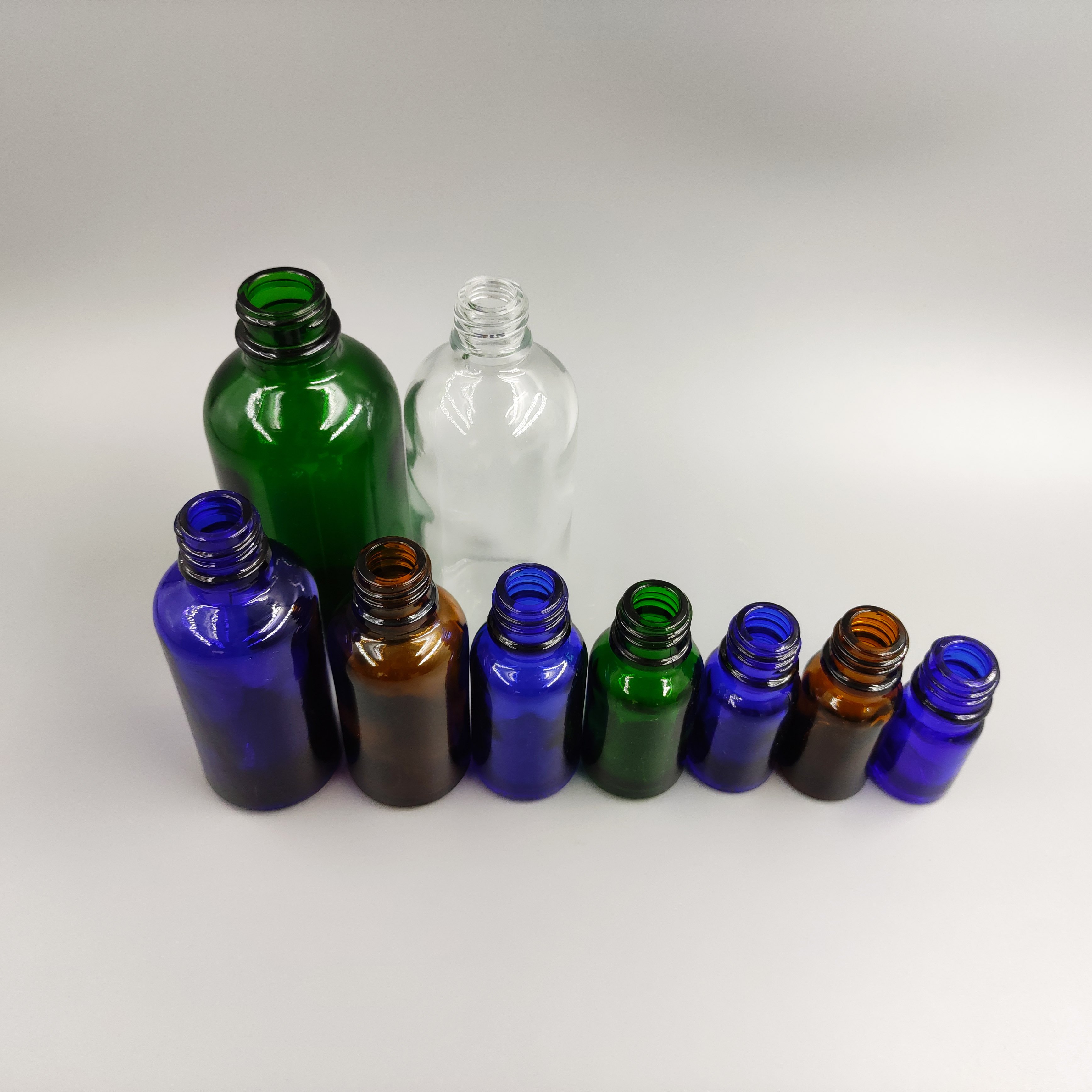 5ml,10ml,15ml,20ml,30ml,50ml,100ml,120ml custom factory wholesale colorful empty glass bottle suppliers
