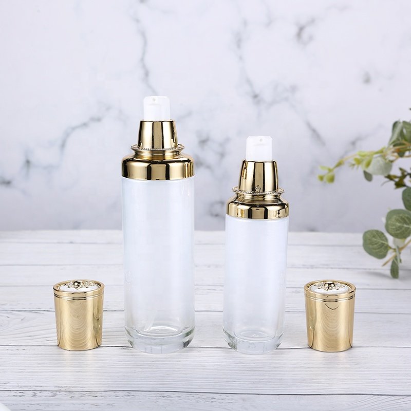 High end glass bottle amber serum press pump bottle face cream can be customized for bottle color and logo printing