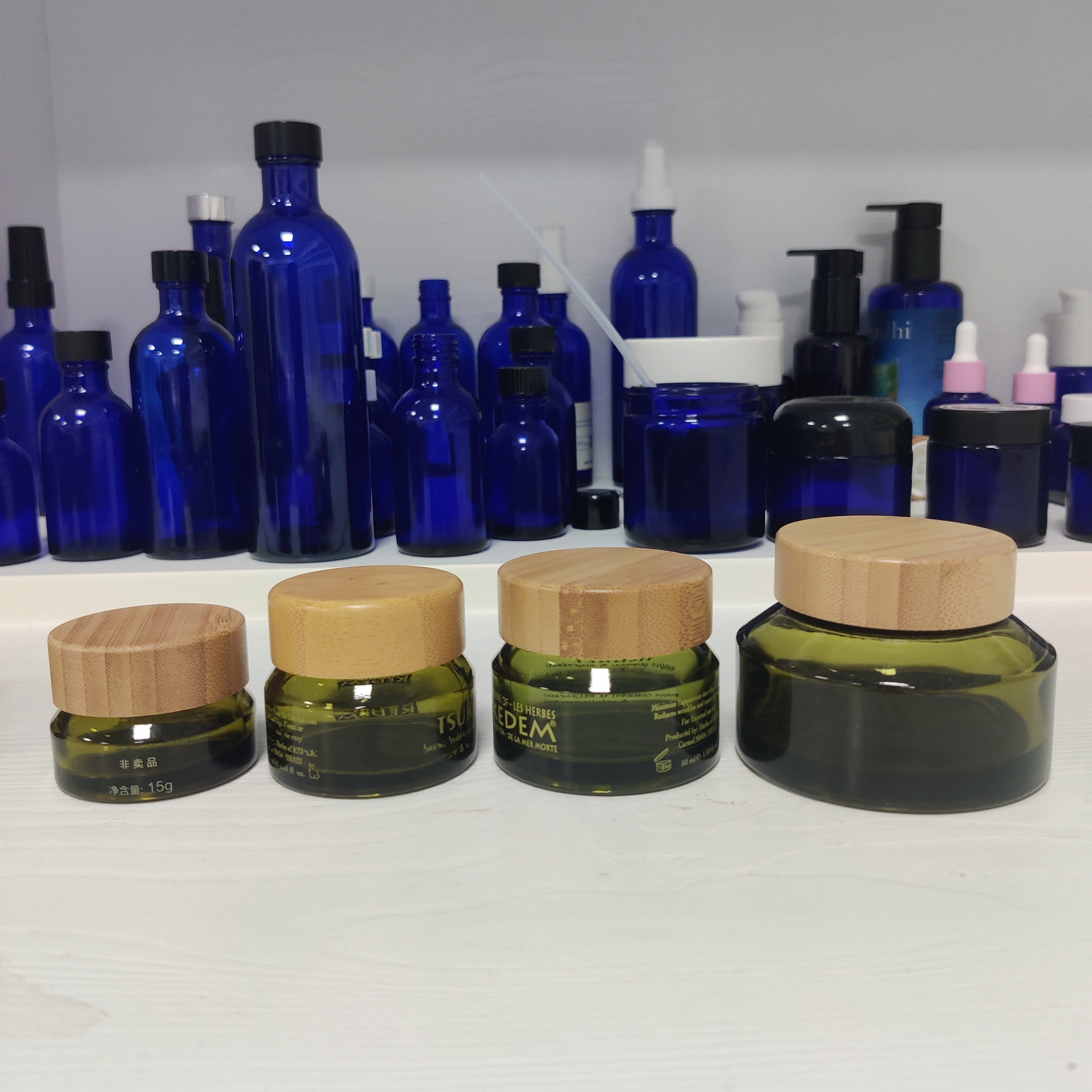 Low MOQ 250ml/500ml/750ml/1000ml dark green square olive oil tea oil bottle fermentation bottle walnut oil glass bottle
