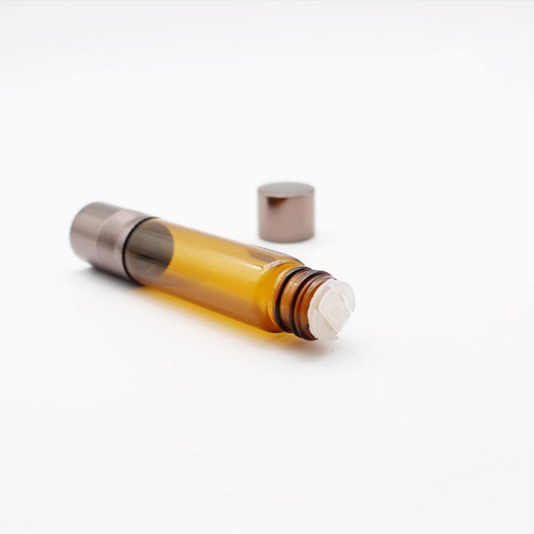 Wholesale 10ml amber double end fitment glass cosmetic essential oil perfume aroma bottle with orifice reducer and roller top