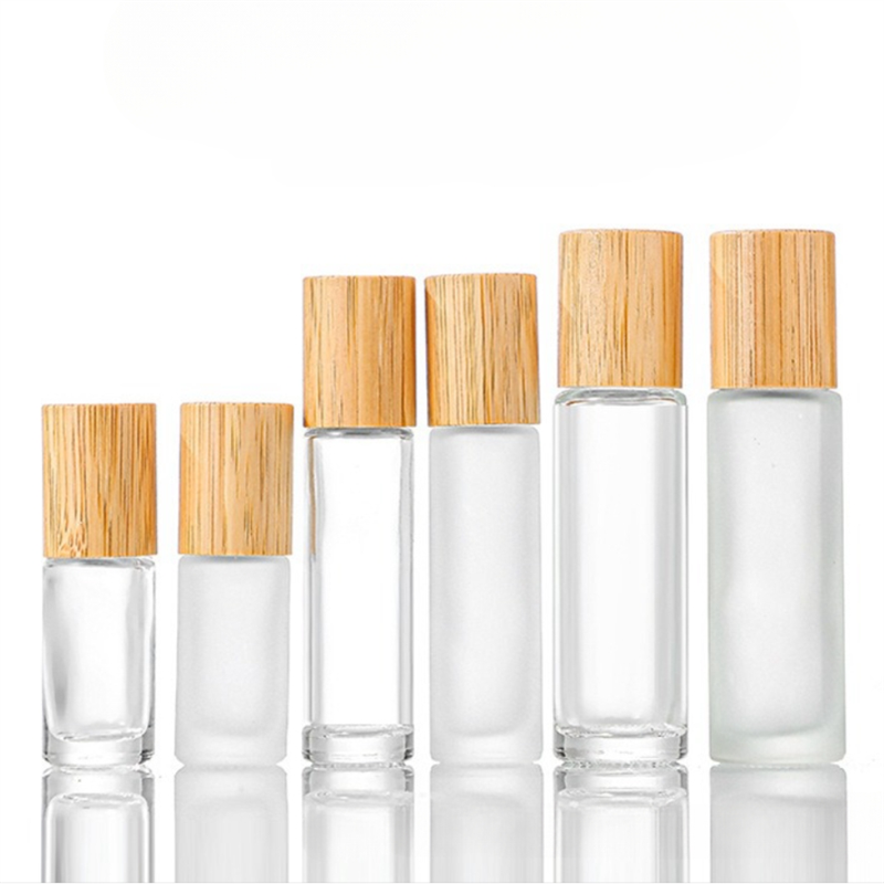 Essential Oil Roll on Glass Bottle Amber with Bamboo Lid and Plastic Steel Roller Cosmetic Hot Stamping Screw Cap 5ml 10ml 15ml