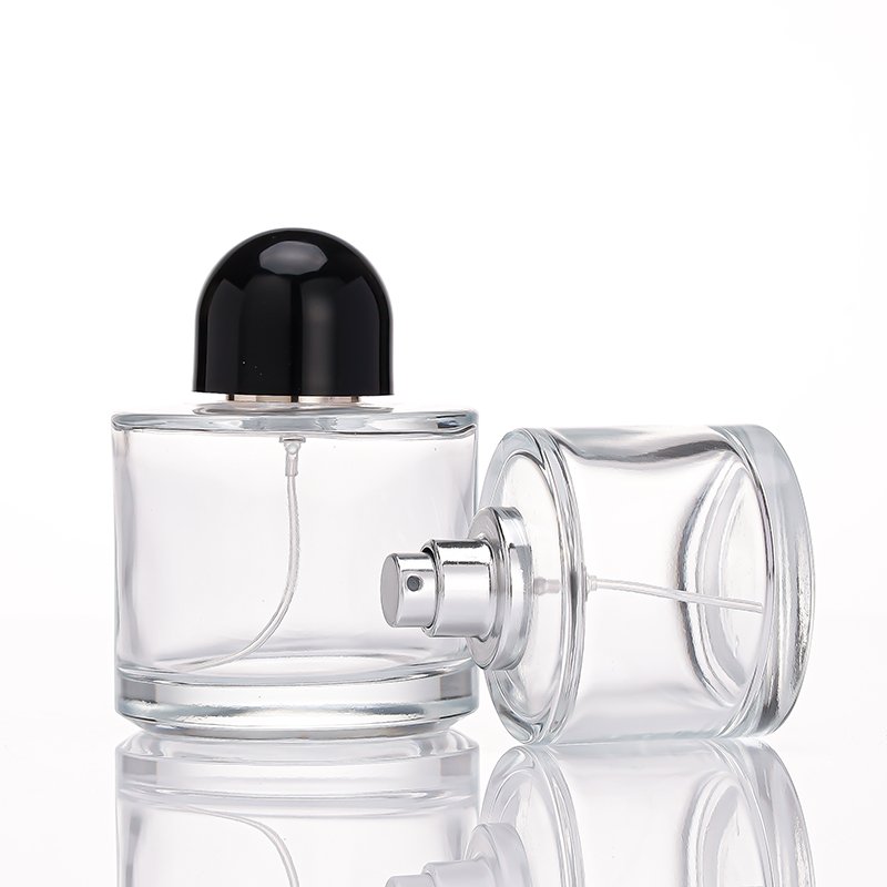 Wholesale fancy 50ml 1.5oz 3oz 100ml perfume glass bottle Atomizer clear round empty perfume bottles 50ml spray bottle black cap