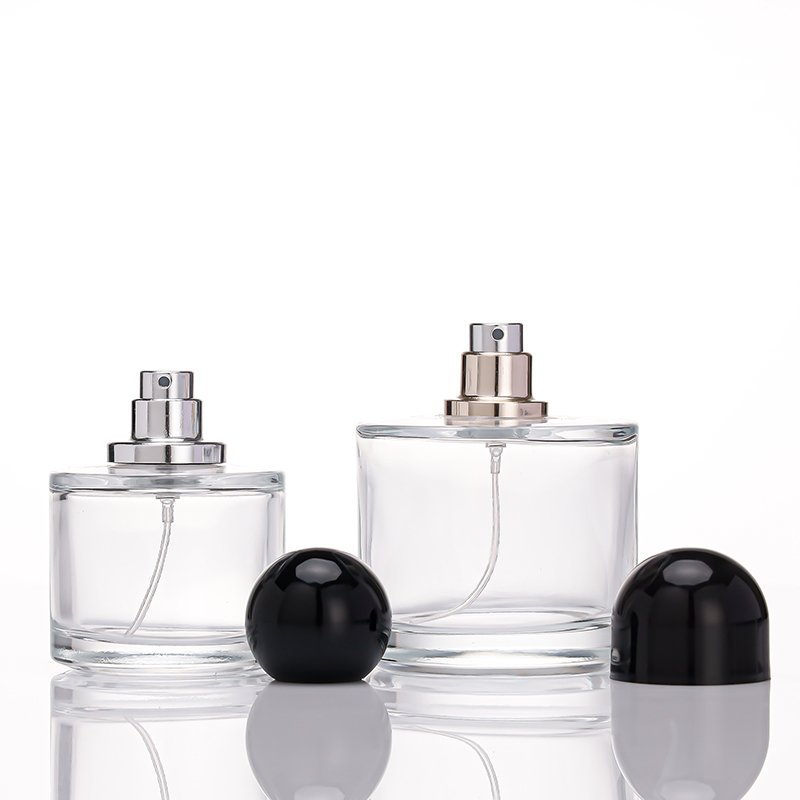 Wholesale fancy 50ml 1.5oz 3oz 100ml perfume glass bottle Atomizer clear round empty perfume bottles 50ml spray bottle black cap